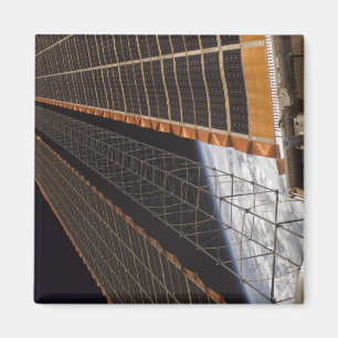 A solar array wing magnet