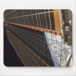 A solar array wing mouse mat