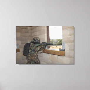 A soldier acts as an opposition force canvas print
