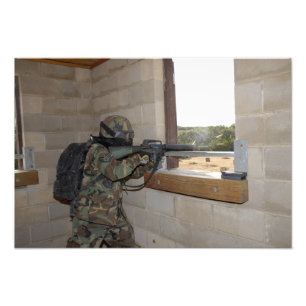 A soldier acts as an opposition force photo print