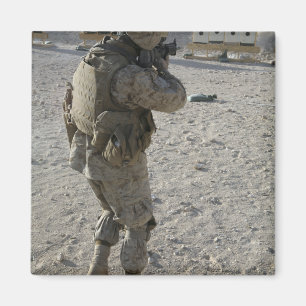 A soldier engages his target on a shooting rang magnet