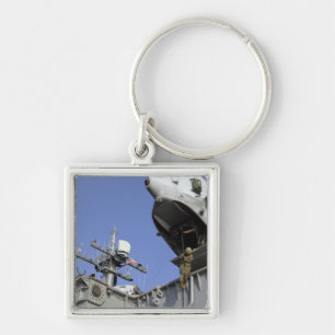 A soldier fast-ropes key ring