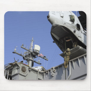 A soldier fast-ropes mouse mat