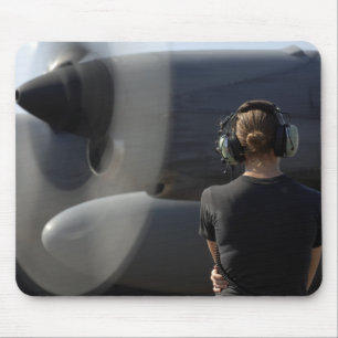 A soldier monitors the performance mouse mat