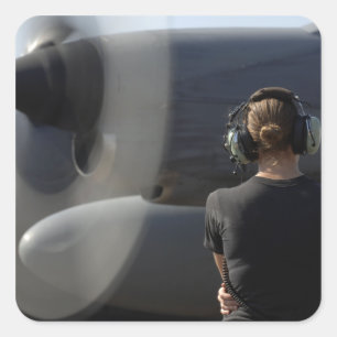 A soldier monitors the performance square sticker