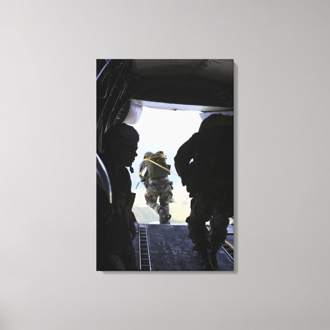 A Soldier performs a static-line jump Canvas Print (Front)