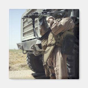 A soldier provides security for Marines Magnet