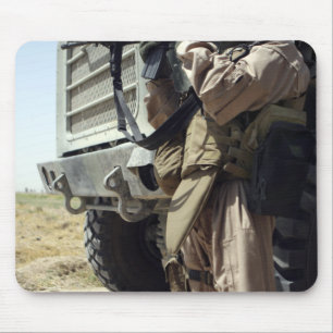 A soldier provides security for Marines Mouse Mat