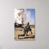 A Soldier reacts to a controlled explos