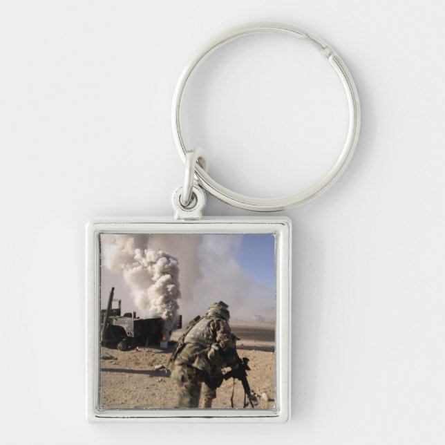 A Soldier reacts to a controlled explos Key Ring (Front)