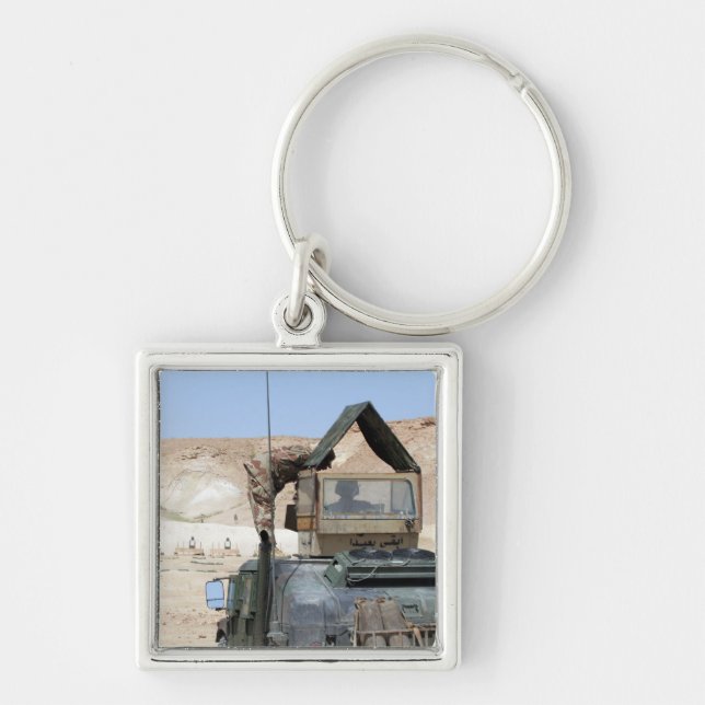 A soldiier instructs an Iraqi army soldier Key Ring (Front)