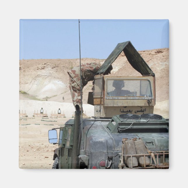 A soldiier instructs an Iraqi army soldier Magnet (Front)