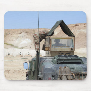 A soldiier instructs an Iraqi army soldier Mouse Mat