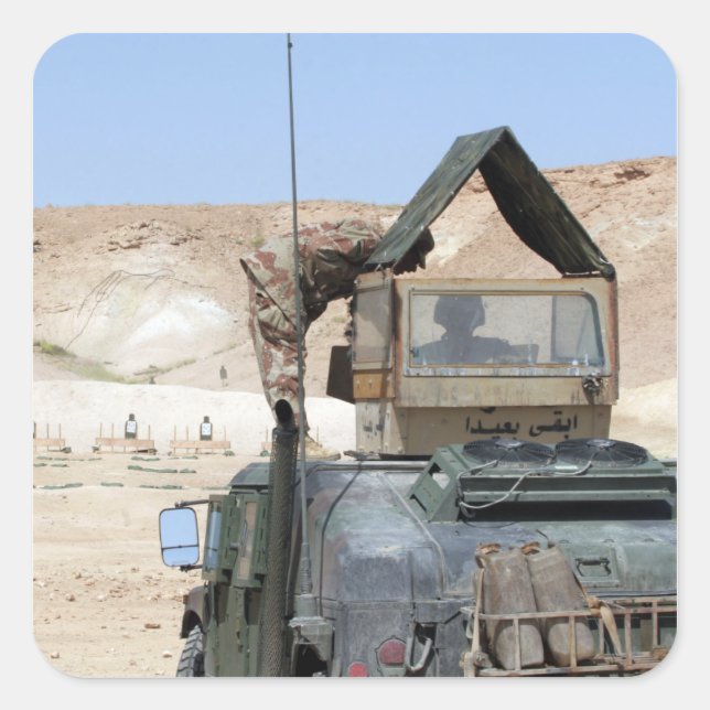 A soldiier instructs an Iraqi army soldier Square Sticker (Front)