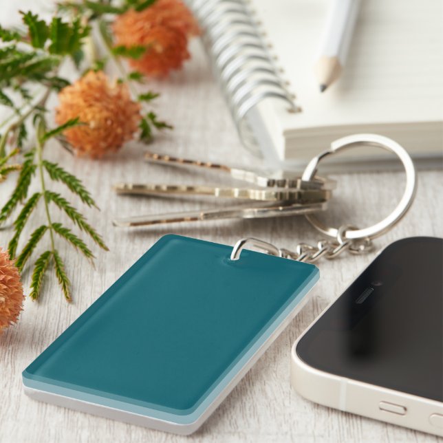 A solid teal colour fills the pattern key ring (Front Right)
