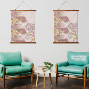 A sophisticated floral arrangement with ornate det hanging tapestry