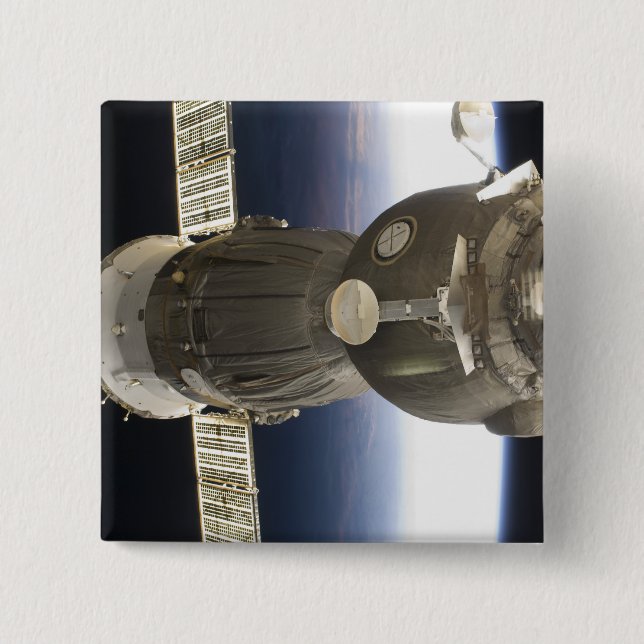 A Soyuz spacecraft backdropped by Earth 15 Cm Square Badge (Front)