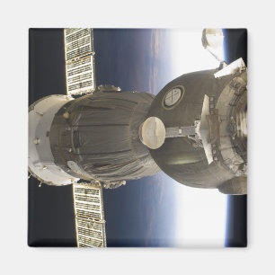 A Soyuz spacecraft backdropped by Earth Magnet