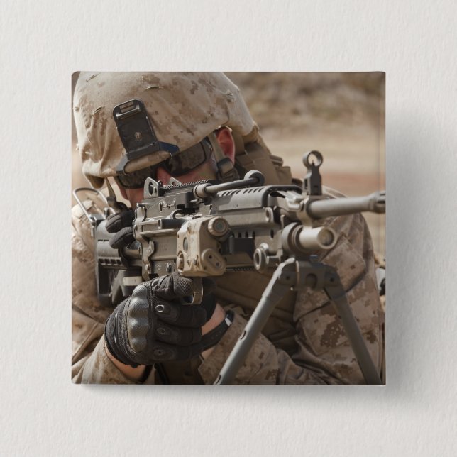 A squad automatic weapon gunner provides securi 15 cm square badge (Front)