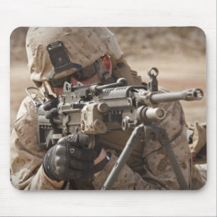 A squad automatic weapon gunner provides securi mouse mat