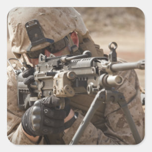 A squad automatic weapon gunner provides securi square sticker