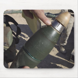 A squad leader points to a delay setting mouse mat