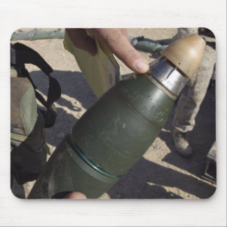 A squad leader points to a delay setting mouse mat