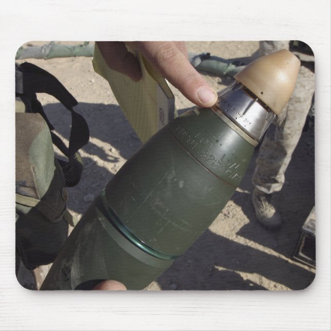 A squad leader points to a delay setting mouse mat (Front)