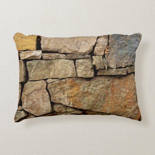 A stone wall made of cobblestones background textu decorative cushion (Front)