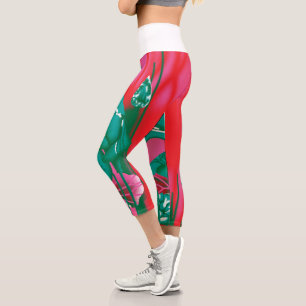 A striking red and green scarf with floral and lea capri leggings
