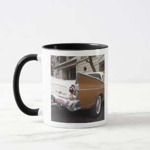 A Studebaker Silver Hawk Classic Car parked on a Mug