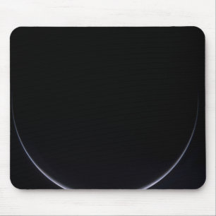 A sun-illuminated crescent of Earth Mouse Mat