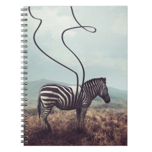 A surreal image of a zebra and two of its black st notebook