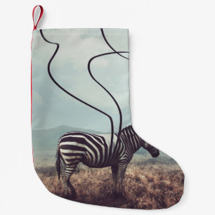 A surreal image of a zebra and two of its black st small christmas stocking