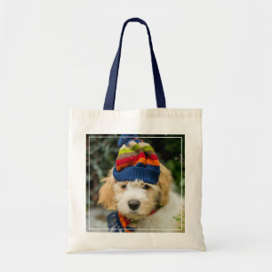 A Sweet Cavachon Puppy In A Winter Hat And Scarf Tote Bag