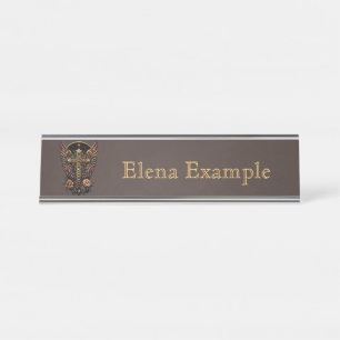 A symbol of strength: The ornate cross with wings. Desk Name Plate