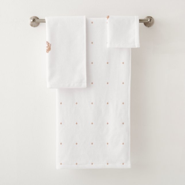 A symmetrical design featuring brown geometric mot bath towel set (Insitu)