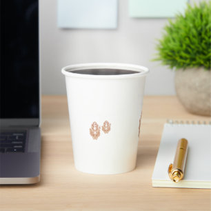 A symmetrical design featuring brown geometric mot paper cups