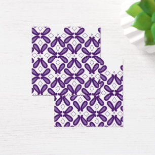A symmetrical pattern featuring white and purple m