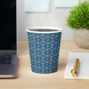 A symmetrical pattern of blue motifs on a textile paper cups
