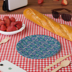 A symmetrical pattern of blue motifs on a textile paper plate