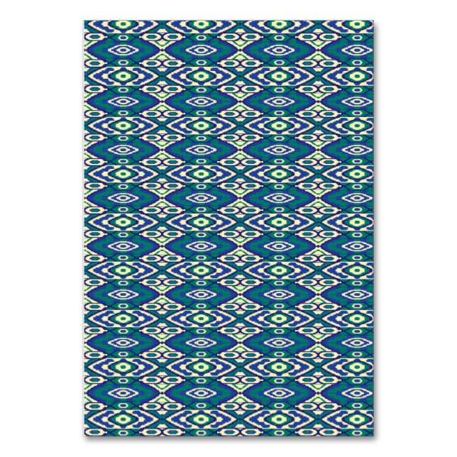 A symmetrical pattern of blue motifs on a textile  table number (Front)