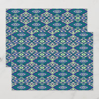 A symmetrical pattern of blue motifs on a textile