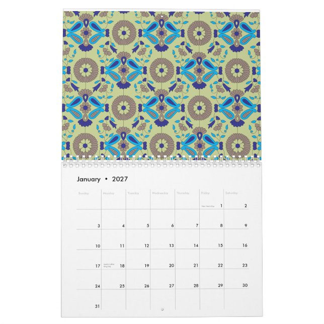 A symmetrical textile design featuring blue and or calendar (Jan 2027)