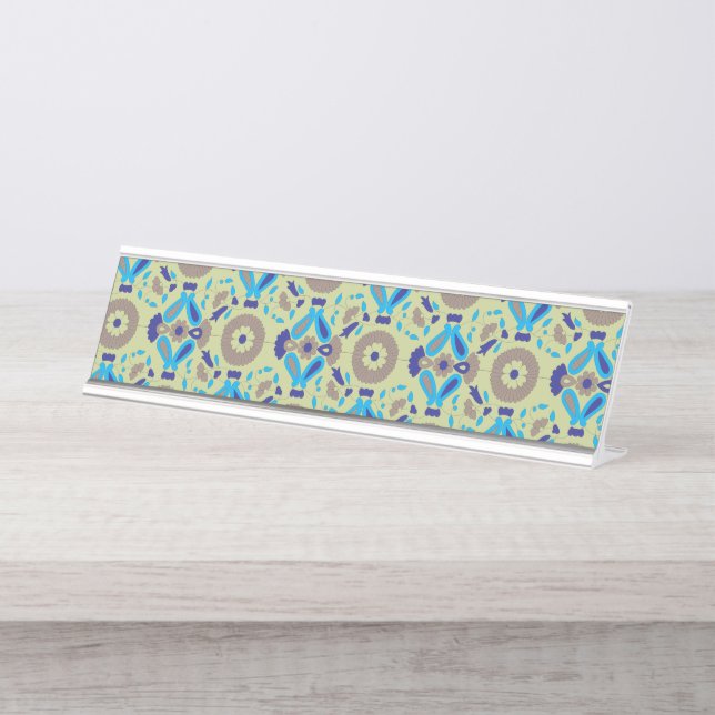 A symmetrical textile design featuring blue and or desk name plate (Front)
