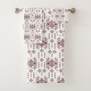 A symmetrical white wrapping paper featuring a rep bath towel set
