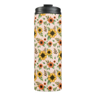 A tall white tumbler with vibrant sunflower