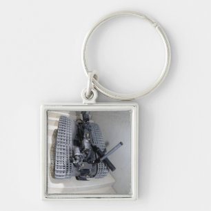 A Talon 3B robot unit climbing a flight of stai Key Ring