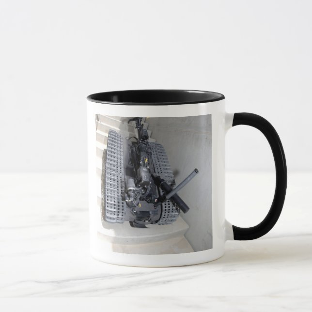 A Talon 3B robot unit climbing a flight of stai Mug (Right)