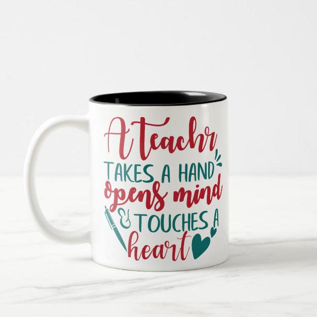 A teacher takes a hand opens mind & touches a hear Two-Tone coffee mug (Left)
